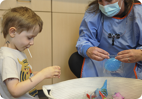Young girl giggling in the dental chair